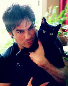 black cat with Ian Somerhalder
