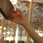 hand reaching for brass ring