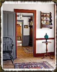 candle stand beside door