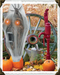 wagon wheel, water pump and pumpkins