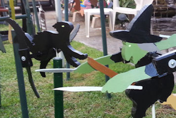 cat and witch whirligigs